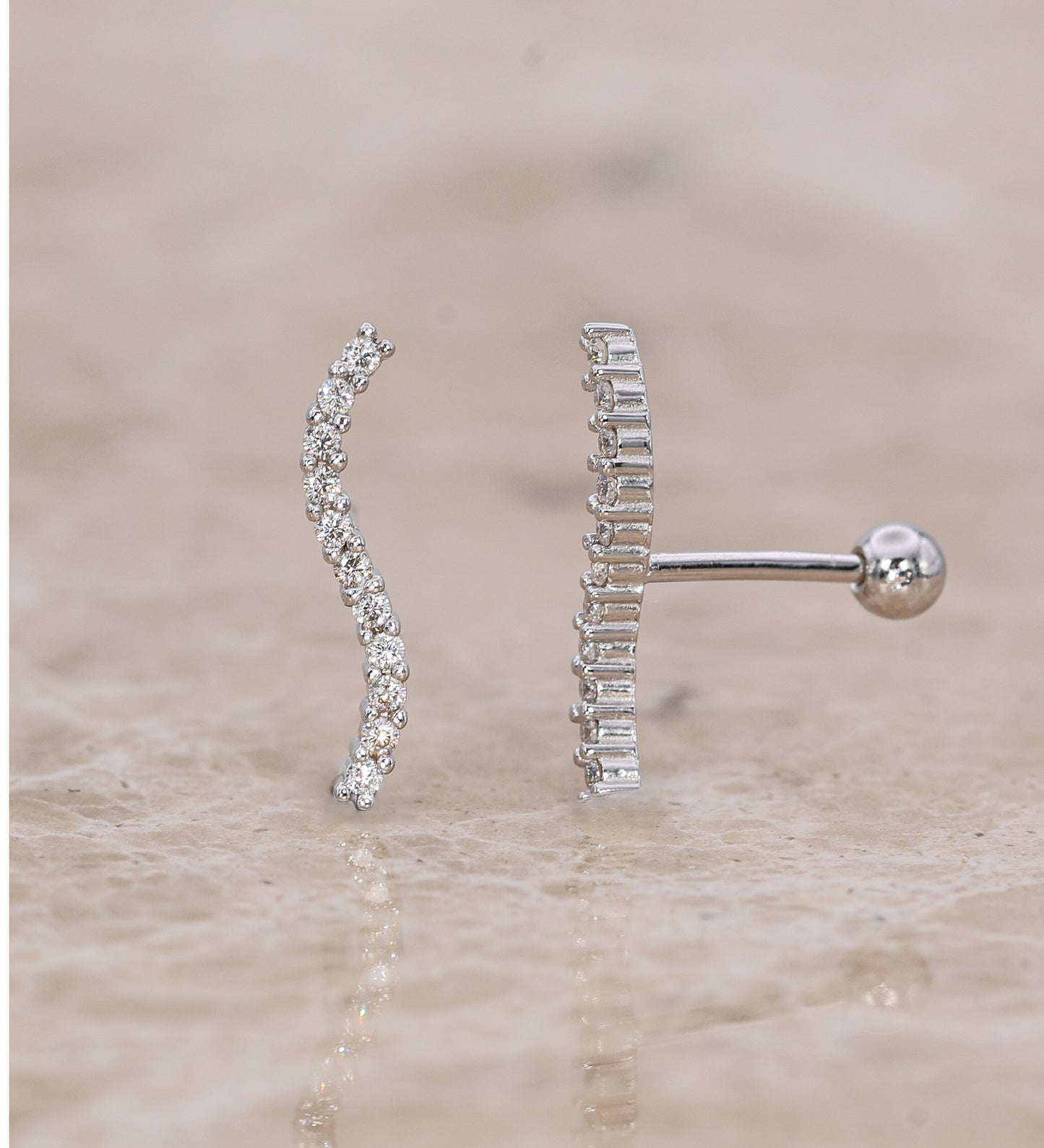 Neris Moissanite Stud Earrings - Piercing