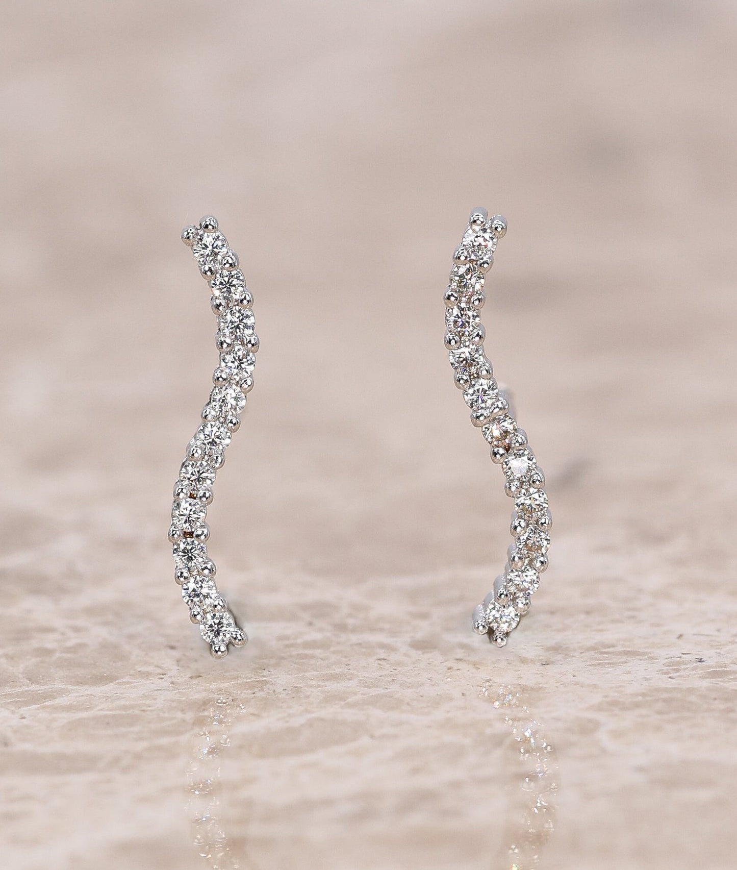 Neris Moissanite Stud Earrings - Piercing